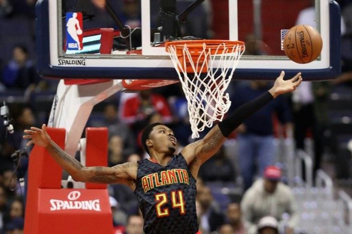 Kent Bazemore of the Atlanta Hawks looses the ball going up for a shot during a NBA game in Washington, DC