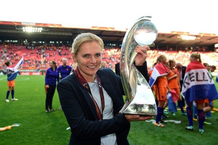 Netherlands' head coach Sarina Wiegman celebrates with the trophy after winning with her team the UEFA Women's Euro 2017 tournament final match against Denmark, at FC Twente Stadium in Enschede, on August 6, 2017