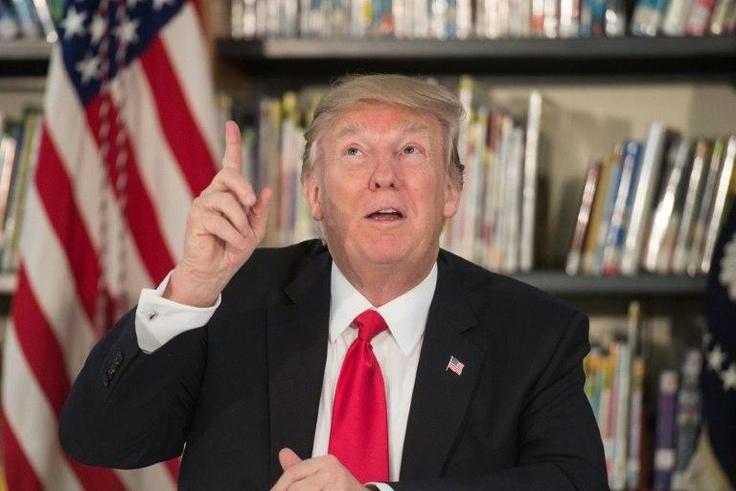 US President Donald Trump has accused his political foes of conducting "a total witch hunt" as they press for an investigation into his ties with Russia
