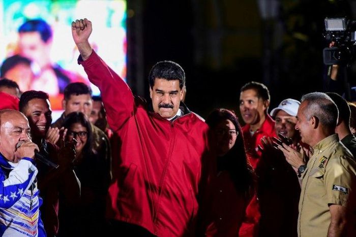 Venezuelan President Nicolas Maduro celebrates the results of the election of a "Constituent Assembly" that the country's attorney general denounces as an illegitimate expression of "dictatorial ambition"