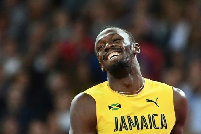 Jamaica's Usain Bolt smiles after placing third in the final of the men's 100m at the 2017 IAAF World Championships in London on August 5, 2017