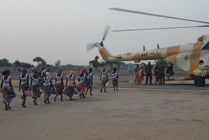 Some of the rescued Chibok Girls board a military helicopter