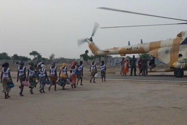 Some of the rescued Chibok Girls board a military helicopter