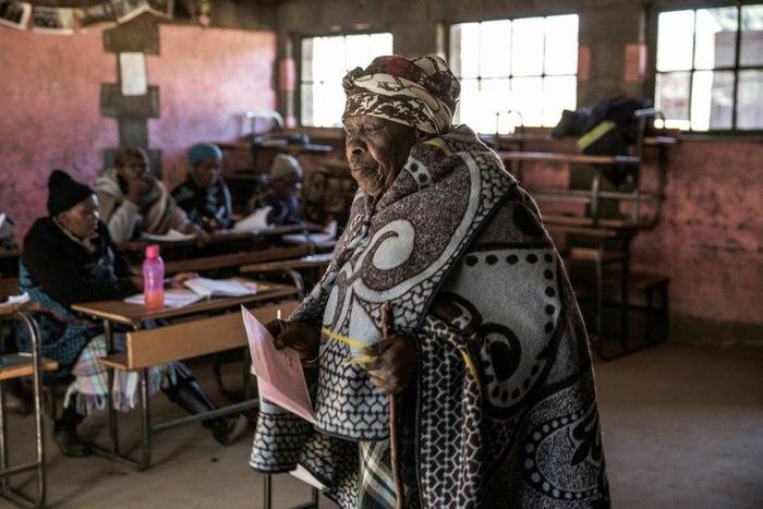A woman votes during Lesotho's June general election, the landlocked kingdom's second snap poll in three years