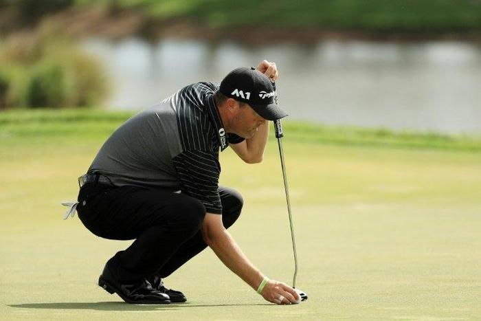Ryan Palmer of the United States lines up a putt on the first green during the second round of The Honda Classic at PGA National Resort and Spa on February 24, 2017 in Palm Beach Gardens, Florida