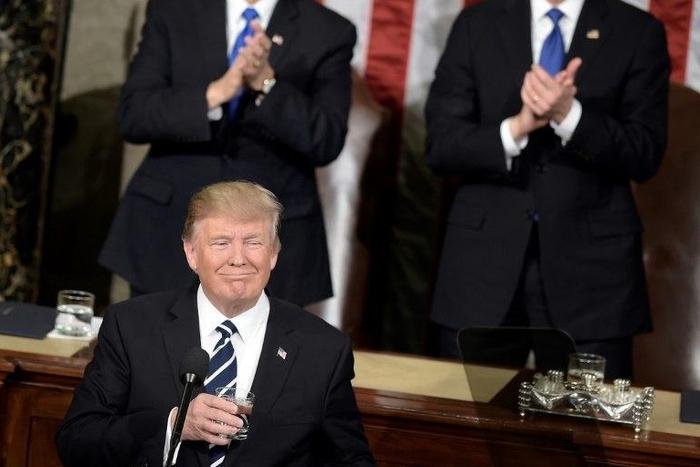 US President Donald Trump pauses for applause while speaking during a joint session of Congress on Capitol Hill February 28, 2017 in Washington, DC