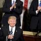 US President Donald Trump pauses for applause while speaking during a joint session of Congress on Capitol Hill February 28, 2017 in Washington, DC