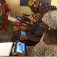 Chibok schoolgirls with Opon Imo tablets