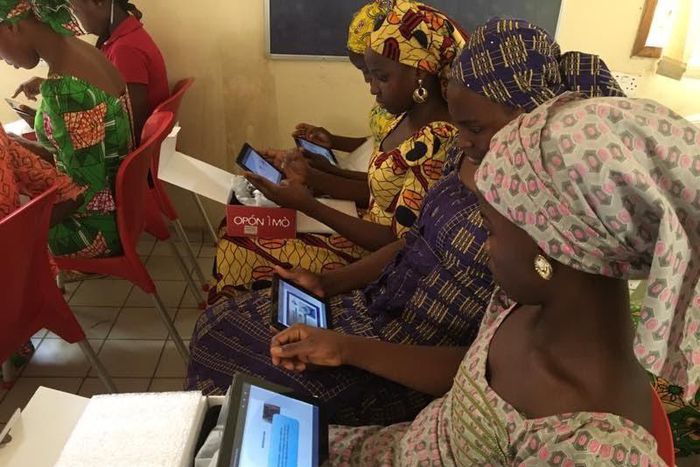 Chibok schoolgirls with Opon Imo tablets