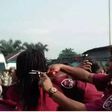 Rivers State Sector Commander, Andrew Kumapayi cutting the hair of some female officers.