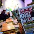 Turkish pro-government daily newspaper Gunes depicts German Chancellor Angela Merkel in a Nazi uniform on March 17, 2017