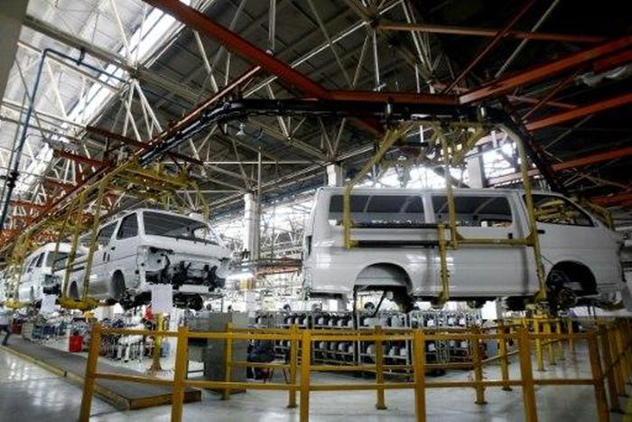 Cars are assembled in a workshop of an automobile factory in Shenyang, northeast China's Liaoning province
