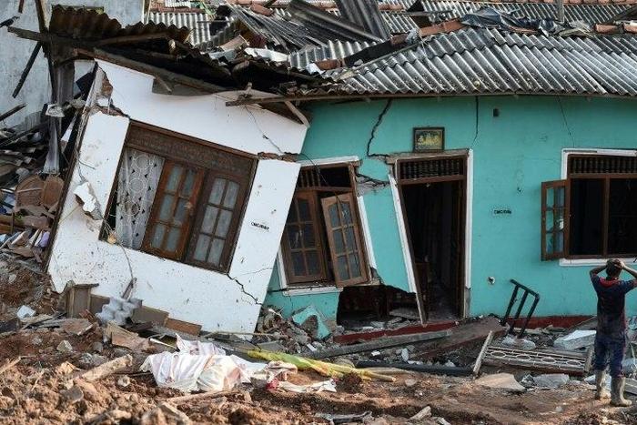 Some 145 homes were destroyed when the 300-foot (90-metre) rubbish mountain came crashing down and police say many more buildings were damaged and could collapse at any time.