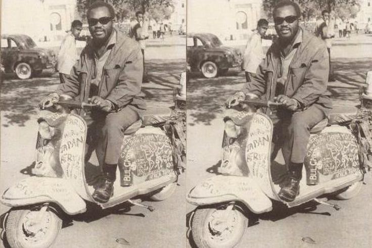 Ajala the traveller on his Vespa