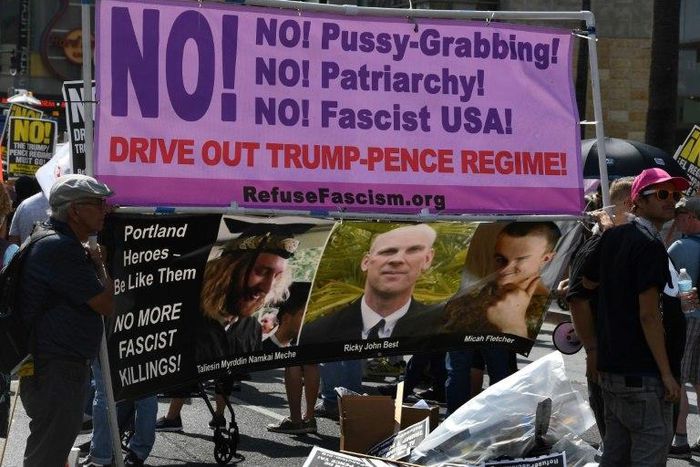 Demonstrators hold a banner at an anti-Trump protest in California, a state which has been at loggerheads with President Donald Trump's administration over various issues