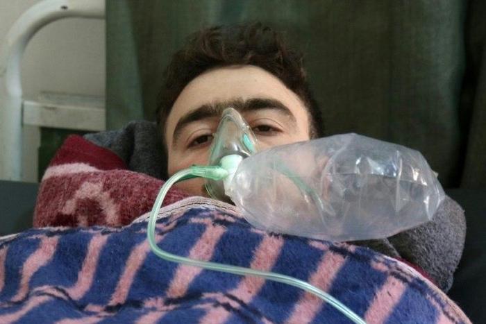 A Syrian man receives treatment at a small hospital in the town of Maaret al-Noman following a suspected chemical gas attack in Khan Sheikhun, on April 4, 2017