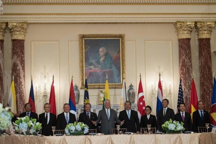 US Secretary of State Rex Tillerson poses with ASEAN foreign ministers prior to a luncheon at the State Department in Washington, DC, on May 4, 2017