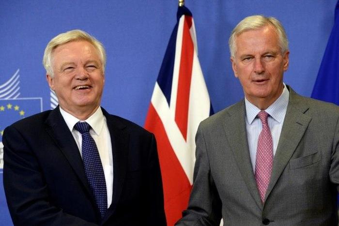 Britain's Brexit Minister David Davis (L) and European Union Chief Negotiator in charge of Brexit negotiations Michel Barnier pictured prior to their meeting at the European Union Commission headquarter in Brussels on July 17, 2017