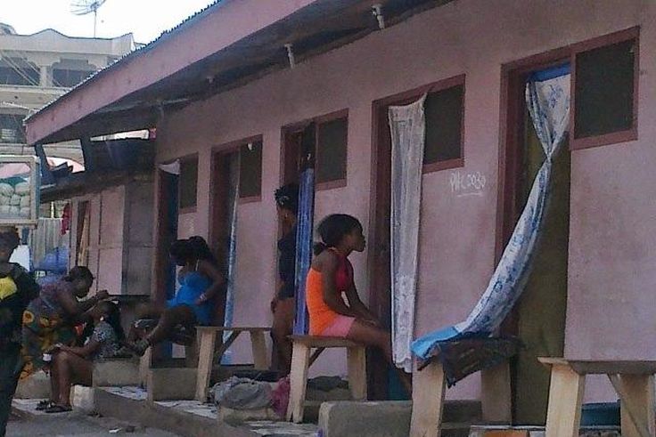 Prostitutes in front of their brothel