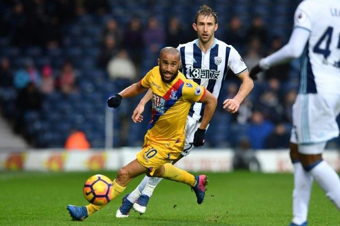 Crystal Palace's Andros Townsend runs with the ball during their English Premier League football match against West Bromwich Albion in West Bromwich, central England, on March 4, 2017 Crystal Palace won the game 2-0.