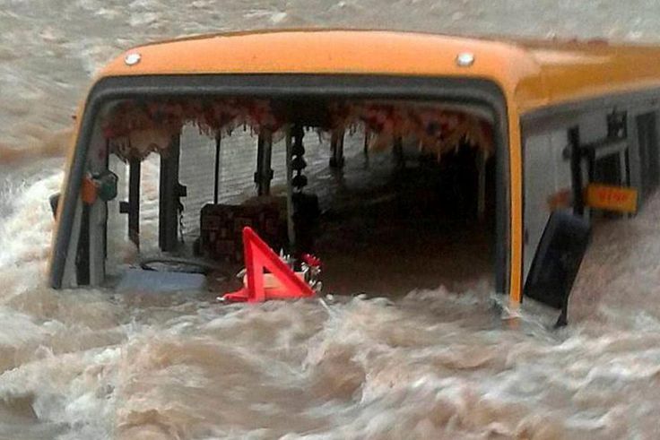Bus plunges into river