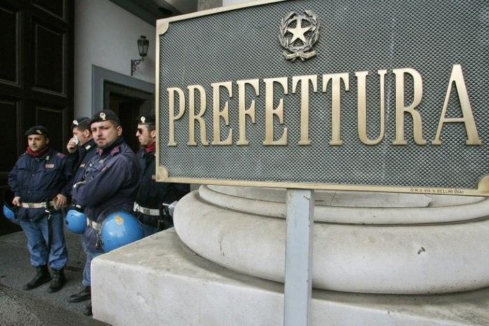 Police, seen here standing outside the Naples' prefecture, spent two years investigating the scam