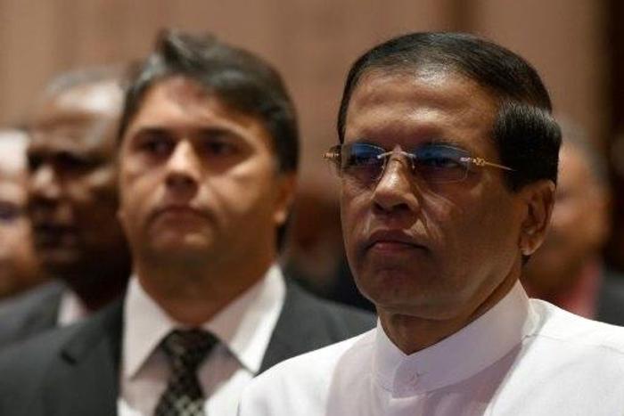Sri Lanka's President Maithripala Sirisena (right) pictured in Colombo on December 19, 2016