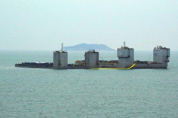 Barges during a salvage project to bring the sunken Sewol ferry back to surface in the sea off the southwestern island of Jindo