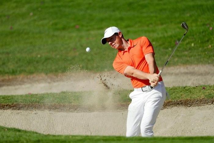 Rory McIlroy of Northern Ireland blasts from a bunker during practie for the World Golf Championships Mexico Championship at Club De Golf Chapultepec on March 1, 2017