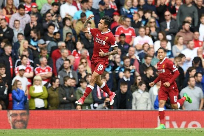 Liverpool's midfielder Philippe Coutinho celebrates scoring his team's second goal against Middlesbrough on May 21, 2017