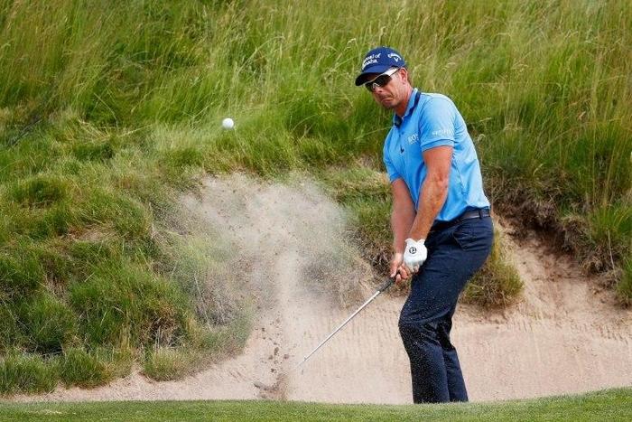 Henrik Stenson of Sweden plays his shot out of the bunker on the 16th hole during the second round of the 2017 U.S. Open at Erin Hills on June 16, 2017 in Hartford, Wisconsin