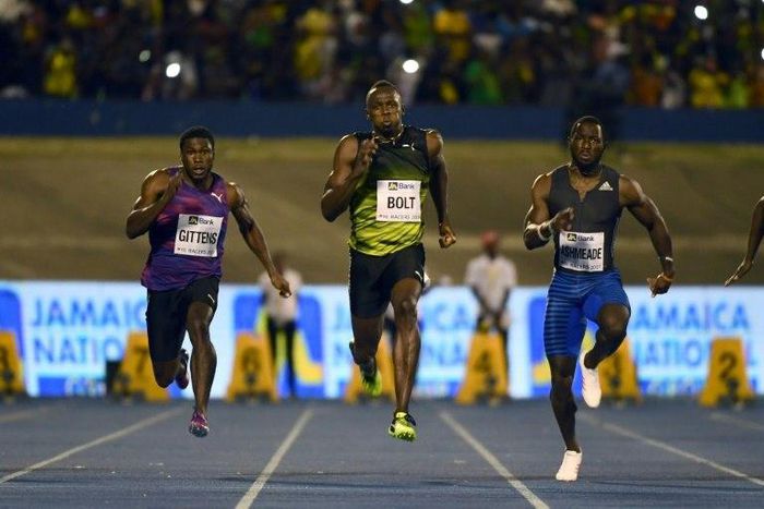 Usain Bolt ran in front of a sea of green and yellow clad Jamaican fansand cruised to victory in a time of 10.03, well below his world record time but good enough to beat a solid field that included runner-up Javaughn Minzie of Jamaica