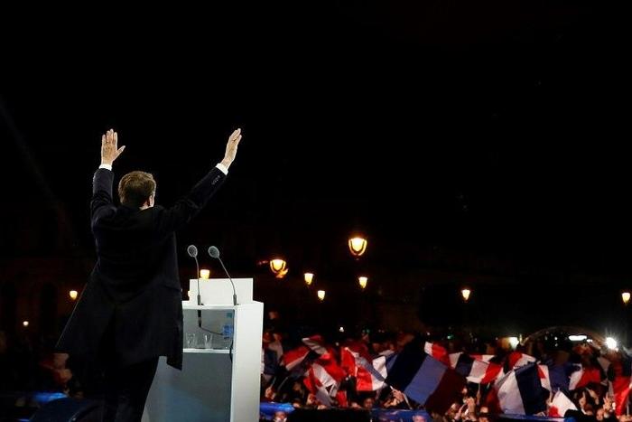 France's president-in-waiting Emmanuel Macron told crowds outside the Louvre: "Everyone told us it was impossible"