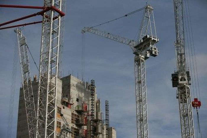 Britain's economy grew by a better-than-expected 0.7 percent in the final three months of last year, official revised data showed