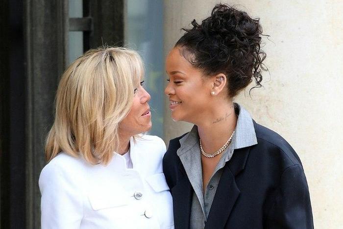 Barbadian R&B icon Rihanna (R) with French First Lady Brigitte Macron in Paris. She described her meeting President Emanuel Macron as 'incredible'.