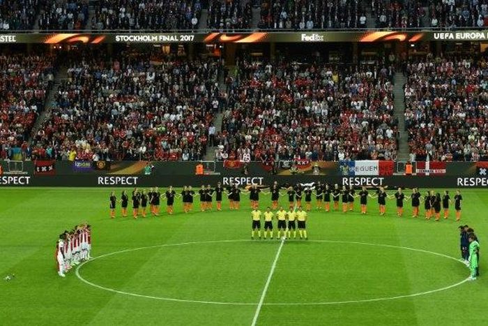 Players of Manchester United and of Ajax Amsterdam observe a minute's silence for the victims of the bomb attack in Manchester ahead of their UEFA Europa League final on May 24, 2017, at the Friends Arena in Solna outside Stockholm