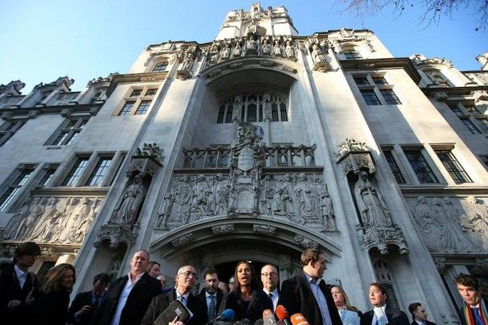 Lead claimant Gina Miller, co-founder of investment fund SCM Private (C), makes a statement outside the Supreme Court, opposite the Houses of Parliament, in central London on January 24, 2017 after the court's ruling on triggering Brexit