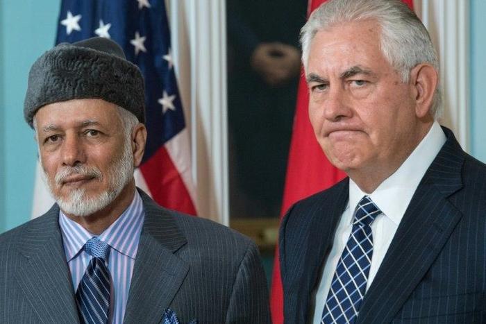 US Secretary of State Rex Tillerson(R) answers a question from the media standing with the Foreign Minister of Oman, Yusuf bin Alawi-bin Abdullah, inside the Treaty Room at US Department of State July 21, 2017, in Washington, DC.
