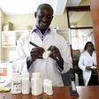 Michael Otieno, a pharmacist, dispenses anti-retroviral (ARV) drugs at the Mater Hospital in Kenya's capital Nairobi, September 10, 2015.      REUTERS/Thomas Mukoya