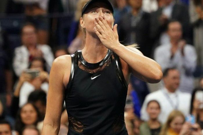 Maria Sharapova of Russia celebrates her victory over Simona Halep of Romania in their 2017 US Open first round match, in New York, August 28