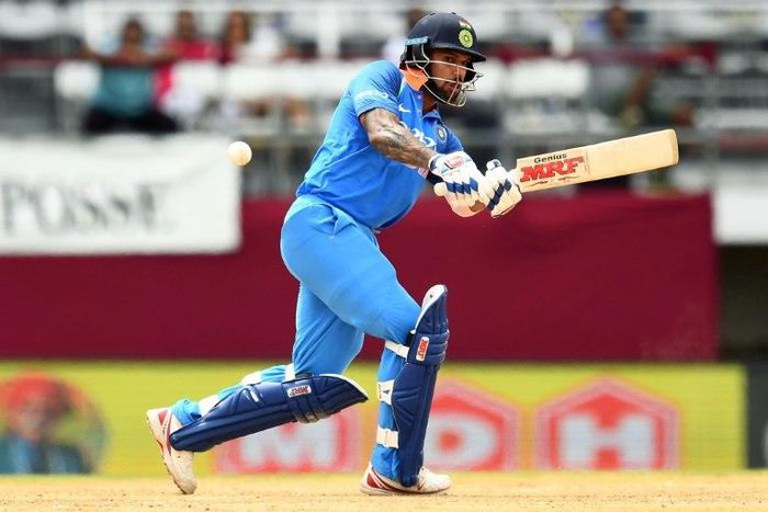 India's Shikhar Dhawan plays a shot during the first One Day International (ODI) match between West Indies and India at the Queen's Park Oval in Port of Spain, Trinidad, on June 23, 2107
