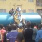 The corpse of the fuel thief being removed from the petrol tanker
