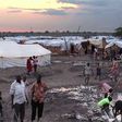 The IDP camp at Bentiu in northern South Sudan is a collection of mud-and-tarp houses arranged in blocks and bracketed by trenches of slimy green sewage that serve as playgrounds for children