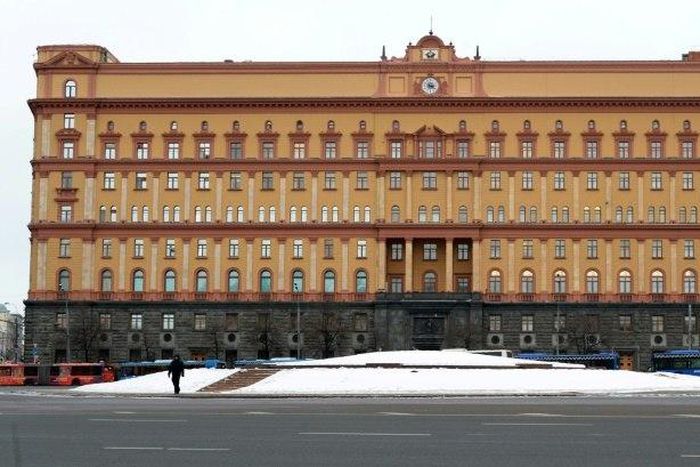 A man walks past the headquarters of the FSB security service, the successor to the KGB in central Moscow on December 30, 2016