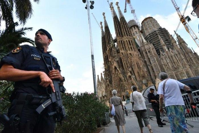 Barcelona is boosting security around key tourist sites after a suspected member of the cell behind the vehicle rampages in Spain last week admitted in court that they had been planning to bomb monuments in the city