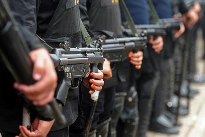 Members of Bangladesh's elite Rapid Action battalion force are among the 26 sentenced to death for the murder of seven people in 2014