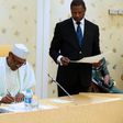 President Muhammadu Buhari signing documents in Abuja on Thursday, August 24, 2017