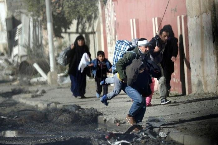 Iraqi civilians were often caught in the crossfire as pro-regime forces fought jihadists for control of east Mosul in November 2016