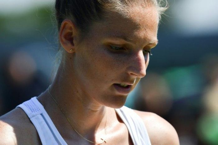 Czech Republic's Kristyna Pliskova takes her seat as she plays against Greece's Maria Sakkari during their women's singles second round match on the third day of the 2017 Wimbledon Championships in London July 5, 2017