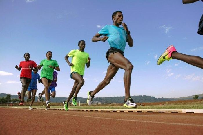 Lelisa Desisa (2nd R) takes part in a practice session on the outskirts of Addis Ababa in March